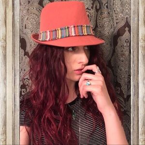 Burnt orange fedora with multicolored band